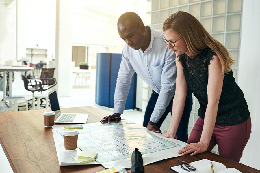 two-architects-discussing-a-building-design